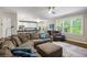 Bright and airy living room flowing into the kitchen with open concept design at 4350 Oakdale Vinings Se Cir, Smyrna, GA 30080