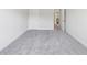 Spacious bedroom featuring neutral walls and soft carpeting at 4775 Columbia St, Cumming, GA 30040