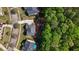Scenic aerial view of residential homes adjacent to mature trees at 1517 Granby Ln, Locust Grove, GA 30248