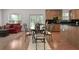 Cozy breakfast nook featuring a glass-top table, elegant chairs, and natural light at 1517 Granby Ln, Locust Grove, GA 30248