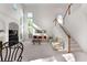 Spacious living room with large windows and comfortable seating area at 1517 Granby Ln, Locust Grove, GA 30248