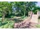 Private backyard with a tiered deck and lush, green landscaping at 3207 Canary Ct, Decatur, GA 30032