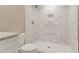Modern bathroom featuring a tiled shower, white toilet, and white vanity with granite countertops at 3207 Canary Ct, Decatur, GA 30032