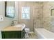 Bathroom featuring a shower and tub combination, vanity, granite countertops, and neutral tile at 3207 Canary Ct, Decatur, GA 30032