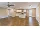 Open-concept kitchen with white cabinets, a granite island, and stainless steel appliances at 3207 Canary Ct, Decatur, GA 30032