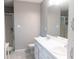 Bathroom featuring double sinks with a shower and toilet area at 1043 Foxhollow Trl, Canton, GA 30115