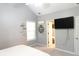 Bedroom with vaulted ceiling and lots of natural light. Features a TV at 1043 Foxhollow Trl, Canton, GA 30115