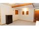 Spacious living room featuring neutral carpeting and a dresser at 1043 Foxhollow Trl, Canton, GA 30115