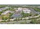 Aerial shot showcases hospital buildings, expansive parking lots, and surrounding trees and landscape at 1610 Glenhurst Dr, Snellville, GA 30078