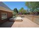 Backyard deck with attached hot tub and view of yard and surrounding trees at 1610 Glenhurst Dr, Snellville, GA 30078