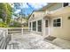 A cozy outdoor space on the back deck with white railings, offering a spot for relaxation and outdoor enjoyment at 2441 Mitchell Ne Rd, Marietta, GA 30062