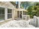 Enjoy outdoor living on this bright back deck, featuring a screened porch, white railings and a convenient bench seat at 2441 Mitchell Ne Rd, Marietta, GA 30062