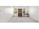 Spacious carpeted bedroom with ample natural light and vintage wooden furniture set at 2441 Mitchell Ne Rd, Marietta, GA 30062