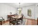 Elegant dining room with decorative rug and hanging light fixture at 2441 Mitchell Ne Rd, Marietta, GA 30062