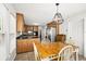 Spacious kitchen area featuring wood cabinets and a breakfast nook at 2441 Mitchell Ne Rd, Marietta, GA 30062