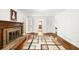 Spacious living room featuring a brick fireplace and bright natural light at 2441 Mitchell Ne Rd, Marietta, GA 30062