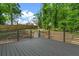 Spacious wooden back deck with railing, perfect for outdoor entertaining and relaxation at 3603 Allpoint Dr, Marietta, GA 30062