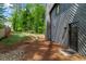 View of the exterior back entrance and fenced yard showcasing the home's access and landscaping at 3603 Allpoint Dr, Marietta, GA 30062