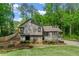 Charming exterior showcasing a well-maintained lawn, stone accents, and a cozy front porch at 3603 Allpoint Dr, Marietta, GA 30062