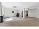 Spacious living area with a ceiling fan, large window, access to the office, and a back door at 3603 Allpoint Dr, Marietta, GA 30062