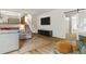 Bright living room with staircase, modern railings, and access to a doorway at 3603 Allpoint Dr, Marietta, GA 30062