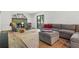 Comfortable living room with a stone fireplace, stylish furniture, and a sliding glass door at 3603 Allpoint Dr, Marietta, GA 30062