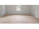 A neutral bedroom features a window at 503 Pinehurst Ln, Woodstock, GA 30188