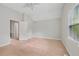 A carpeted bedroom has natural lighting and an open entryway at 503 Pinehurst Ln, Woodstock, GA 30188
