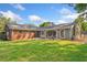 Expansive backyard featuring a well-maintained lawn and a patio perfect for outdoor entertaining at 1153 Chatsworth Dr, Avondale Estates, GA 30002