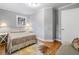 Light-filled bedroom featuring hardwood floors, neutral decor, and a comfortable setting at 1153 Chatsworth Dr, Avondale Estates, GA 30002