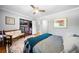 Comfortable bedroom with a ceiling fan, an open closet, and a cozy rug at 1153 Chatsworth Dr, Avondale Estates, GA 30002