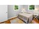 Bright bedroom with hardwood floors, neutral decor, and ample natural light at 1153 Chatsworth Dr, Avondale Estates, GA 30002