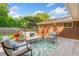 Charming backyard patio area with comfortable seating and serene garden views, perfect for relaxing at 1153 Chatsworth Dr, Avondale Estates, GA 30002
