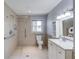 Accessible bathroom with walk-in shower and safety bars at 1312 Harbins Rd, Dacula, GA 30019