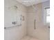 Modern bathroom featuring accessible shower and updated fixtures at 1312 Harbins Rd, Dacula, GA 30019