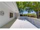 A lovely outdoor white deck area of a well-maintained home, perfect for relaxation and gatherings at 1312 Harbins Rd, Dacula, GA 30019