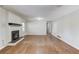 Living room with hardwood floors, fireplace and white trim at 1312 Harbins Rd, Dacula, GA 30019