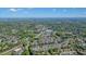 Wide aerial view showcasing the property surrounded by verdant trees and neighborhood at 2525 Ashton Dr, Roswell, GA 30076