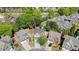 Aerial shot of a neighborhood featuring well-maintained homes and mature trees, highlighting a sense of community and suburban charm at 2525 Ashton Dr, Roswell, GA 30076