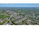 Aerial shot of the home in a tranquil, tree-filled community with nearby amenities at 2525 Ashton Dr, Roswell, GA 30076