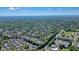 Wide-angle overhead image showing the home nestled in a leafy, vibrant neighborhood at 2525 Ashton Dr, Roswell, GA 30076