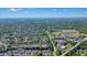 An aerial view shows the neighborhood with mature trees and the home's location in a suburban community at 2525 Ashton Dr, Roswell, GA 30076