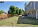 Spacious, fenced backyard with a deck for outdoor living and entertaining at 2525 Ashton Dr, Roswell, GA 30076