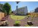 Landscaped backyard featuring a well-maintained lawn and a wooden fence at 2525 Ashton Dr, Roswell, GA 30076