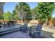 Inviting backyard featuring a patio with furniture and a well-maintained lawn, perfect for outdoor entertaining and relaxation at 2525 Ashton Dr, Roswell, GA 30076