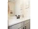 Bathroom featuring a large mirror and white countertops, and gray vanity at 2525 Ashton Dr, Roswell, GA 30076