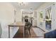 Bright kitchen with stainless appliances, white cabinets, and access to the patio through glass paneled doors at 2525 Ashton Dr, Roswell, GA 30076