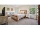 Cozy bedroom features large windows, carpeted floors, and a sitting area at 2525 Ashton Dr, Roswell, GA 30076