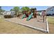 Community playground featuring slides and swings, designed for entertainment and outdoor activity at 2525 Ashton Dr, Roswell, GA 30076