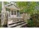 Inviting back deck with pergola, ideal for al fresco dining and relaxation, extends living space into the serene outdoors at 446 Harold Ne Ave, Atlanta, GA 30307